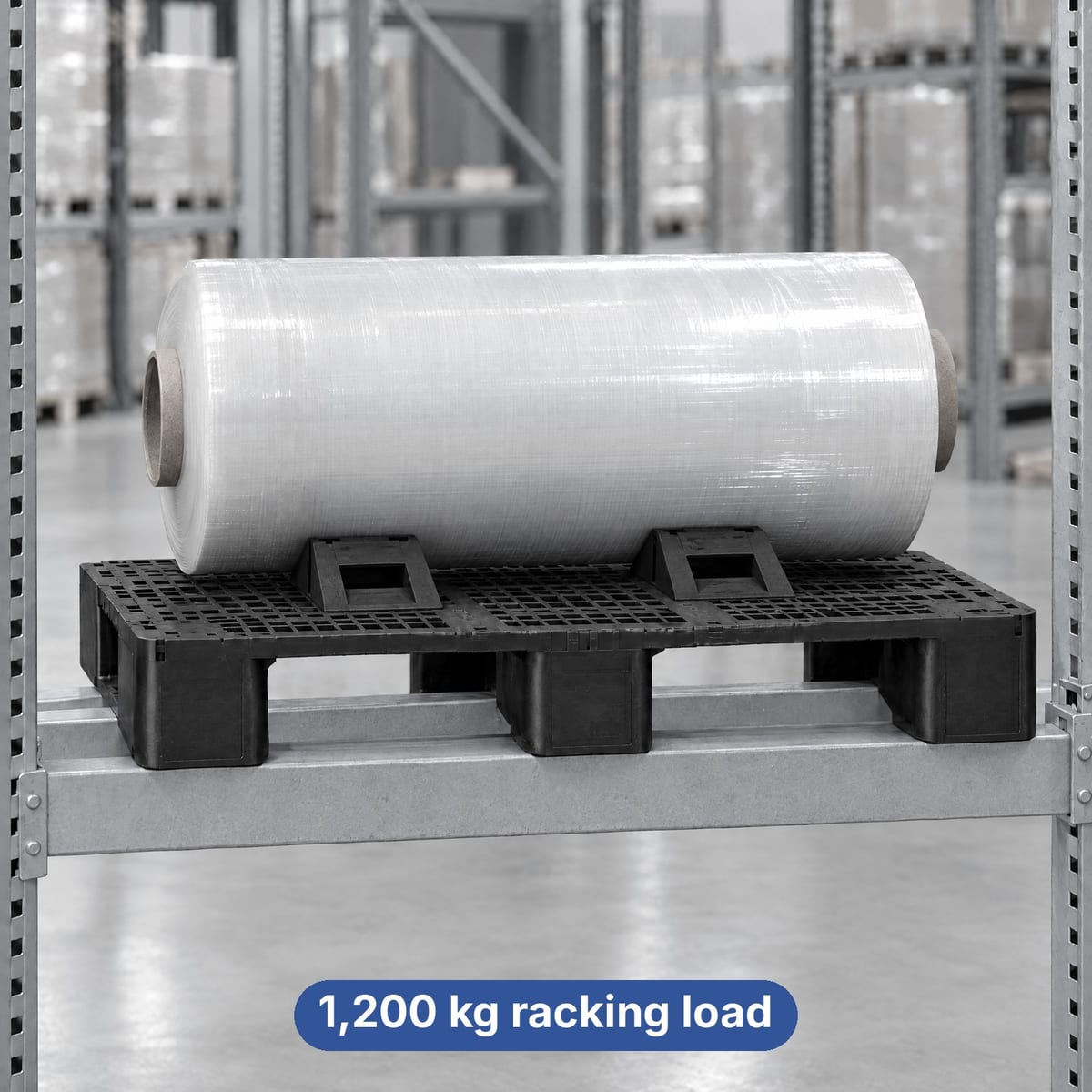 Loaded reinforced plastic pallet spanning two beams of a pallet rack
